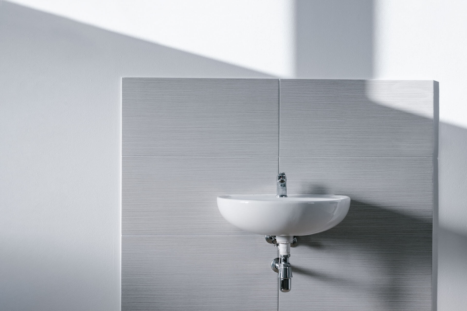 plumbing basin on wall