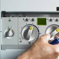 engineer fixing lpg boiler